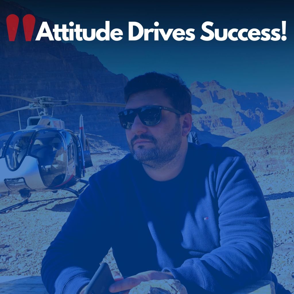 Founder of Attitude Feelings at the Grand Canyon with a helicopter in the background, symbolizing ambition, strategic vision, and high-performance leadership.